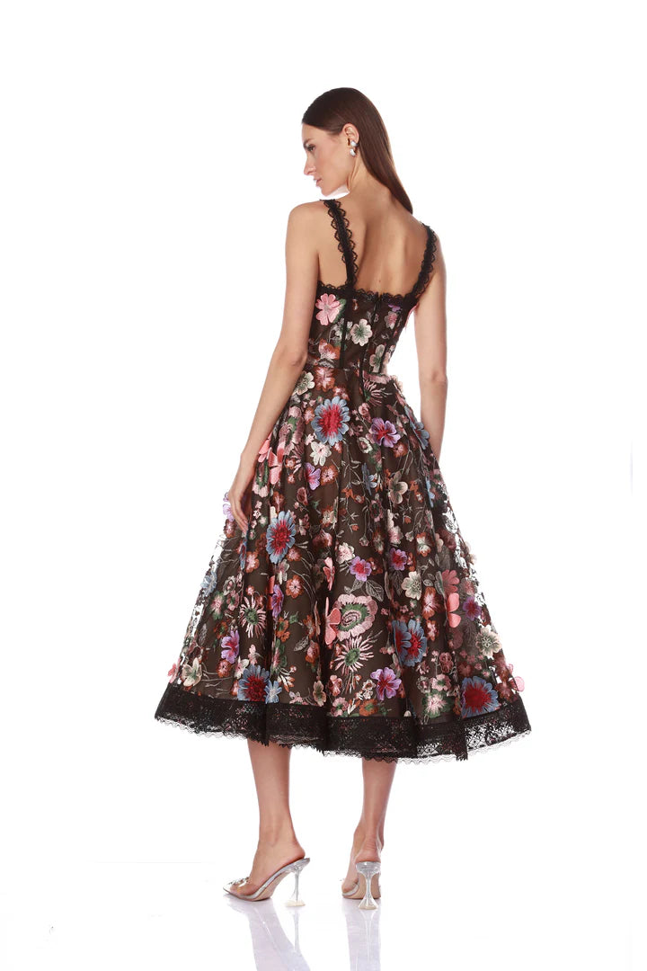 Woman wearing a floral dress with a white background