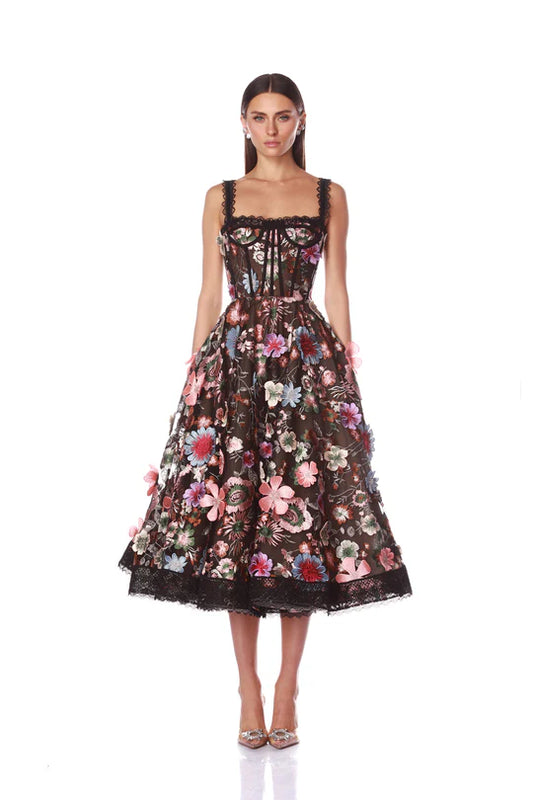 Woman wearing a floral dress on a white background